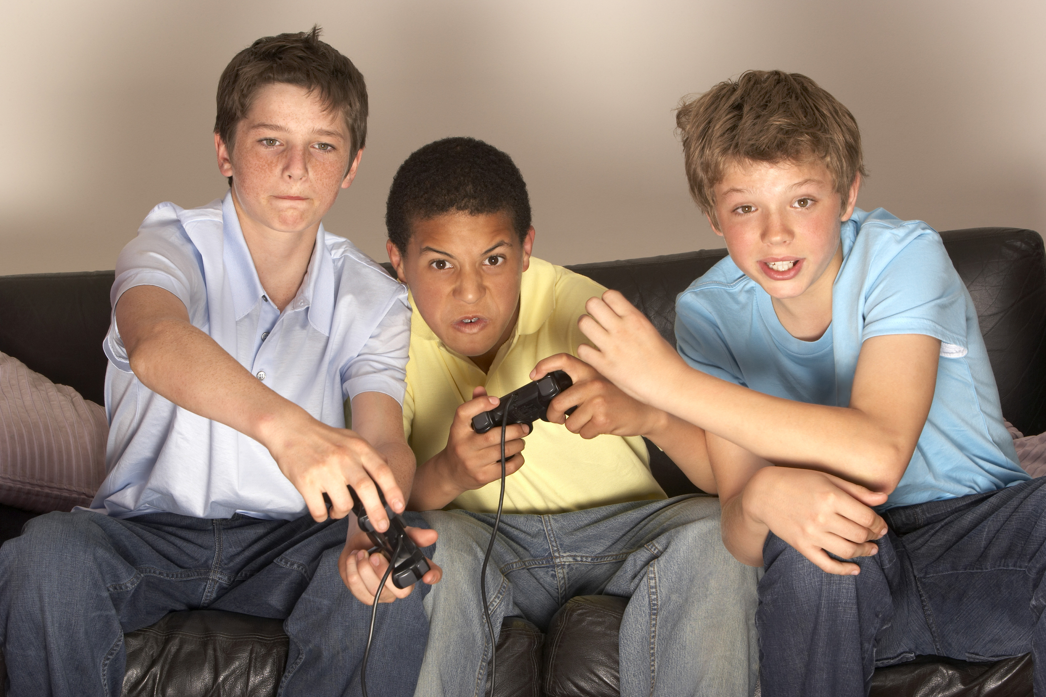 Teenagers playing video game.